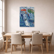 Unframed poster print of Marc Chagall's Les Mariés Sur Fond Bleu displayed on a wall in a dining room