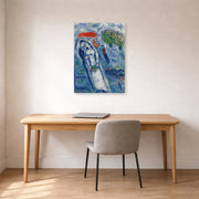 Unframed poster print of Marc Chagall's Les Mariés Sur Fond Bleu displayed on a wall in an office