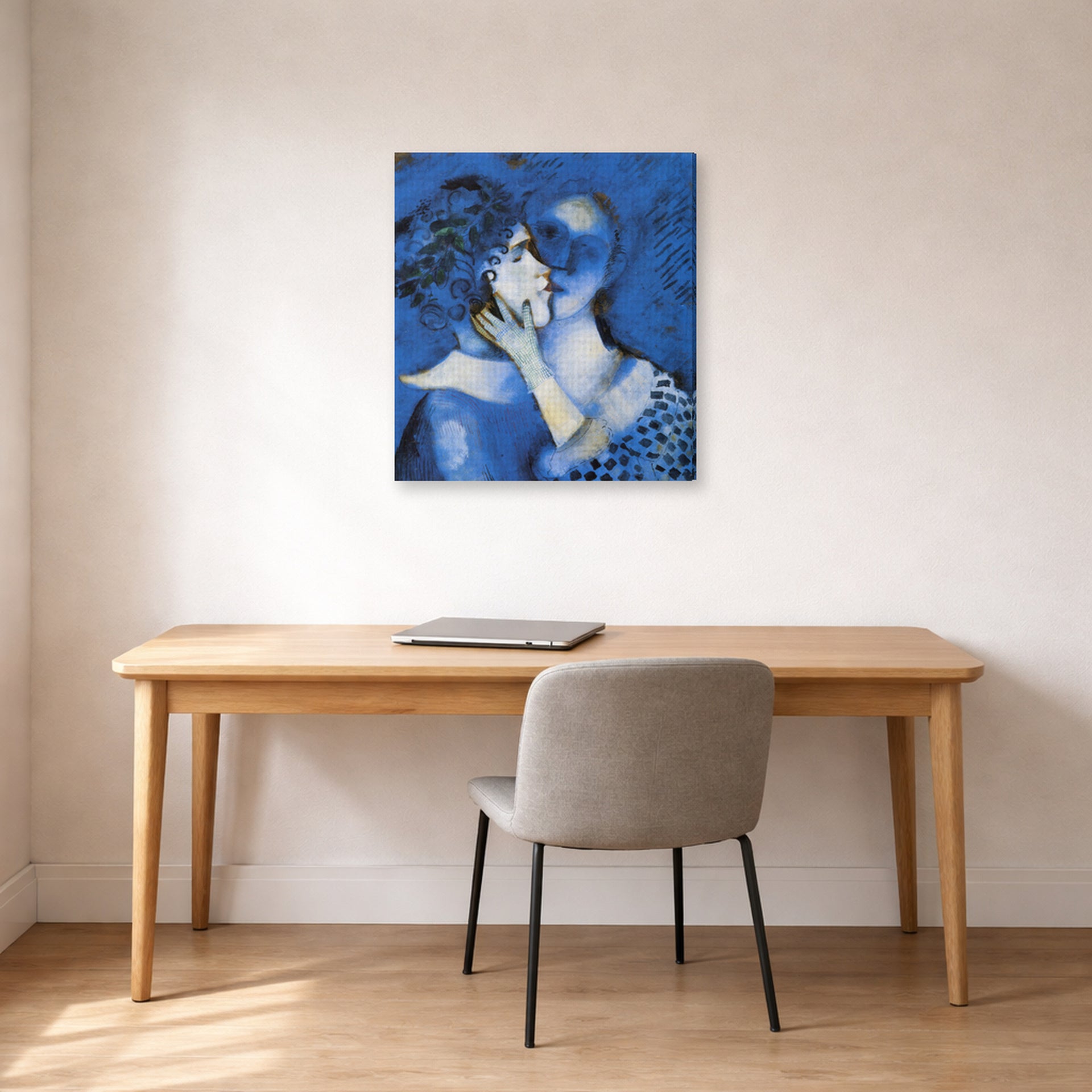 Gallery-wrapped canvas print of Marc Chagall's Lovers in Blue displayed on a wall in an office