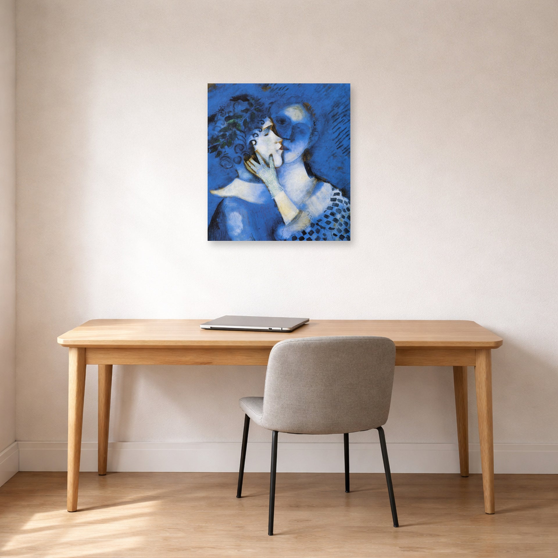 Unframed poster print of Marc Chagall's Lovers in Blue displayed on a wall in an office