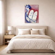 Gallery-wrapped canvas print of Marc Chagall's Moses with the Tablets of Law displayed on a wall in a bedroom