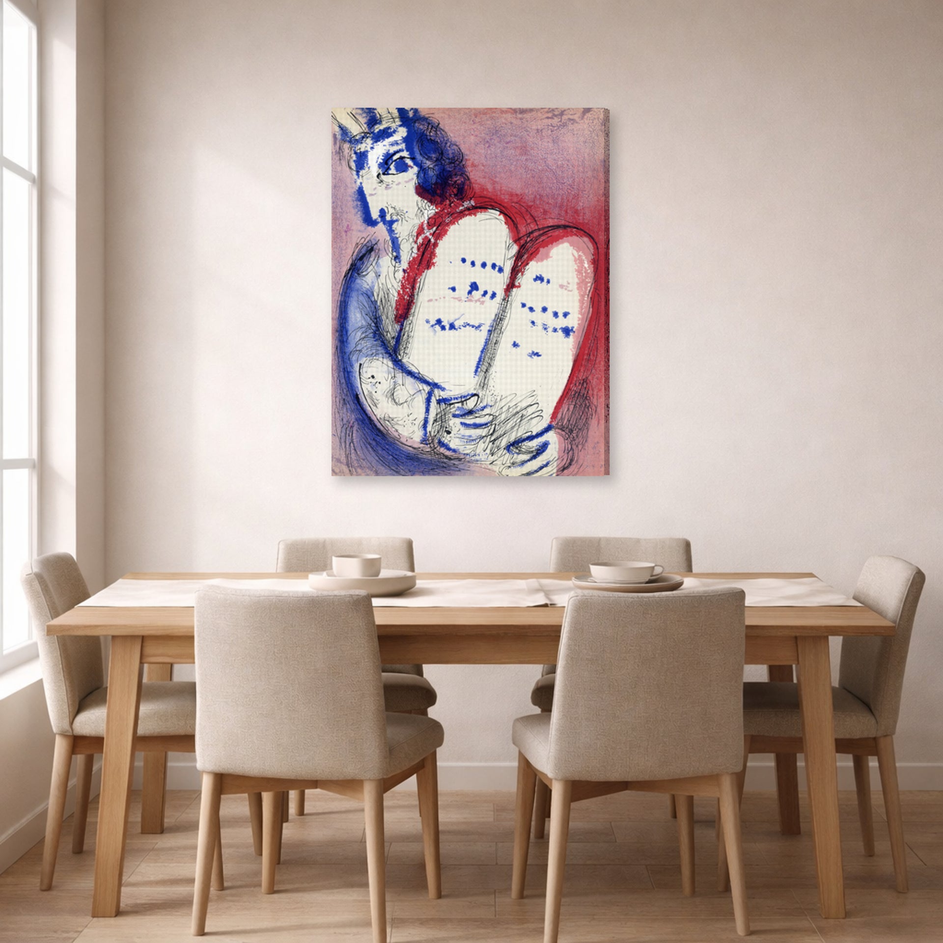 Gallery-wrapped canvas print of Marc Chagall's Moses with the Tablets of Law displayed on a wall in a dining room