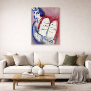 Gallery-wrapped canvas print of Marc Chagall's Moses with the Tablets of Law displayed on a wall in a living room