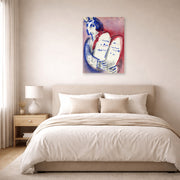 Unframed poster print of Marc Chagall's Moses with the Tablets of Law displayed on a wall in a bedroom
