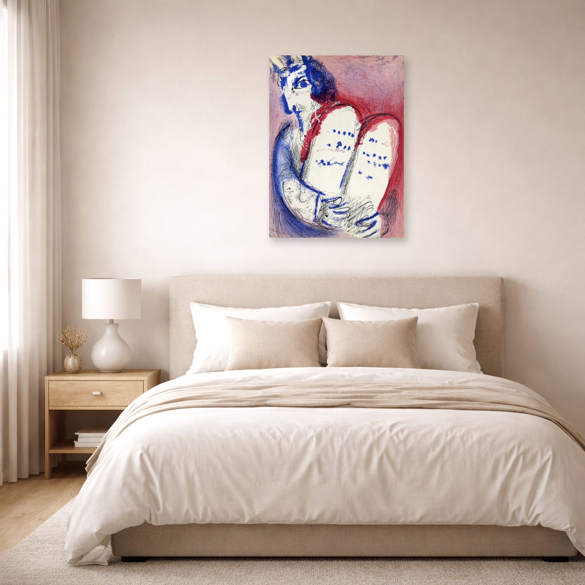 Unframed poster print of Marc Chagall's Moses with the Tablets of Law displayed on a wall in a bedroom