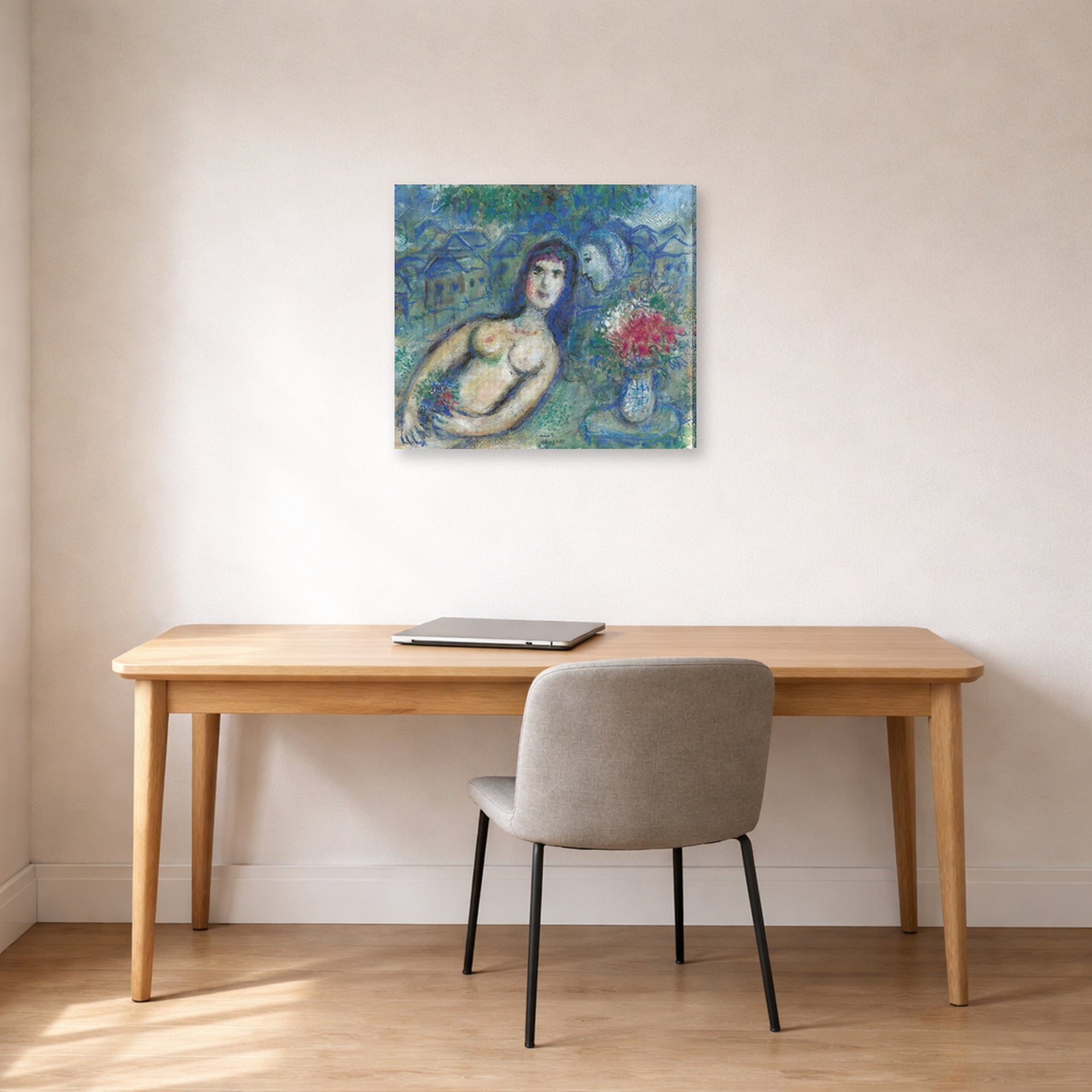 Gallery-wrapped canvas print of Marc Chagall's Nu Incline displayed on a wall in an office