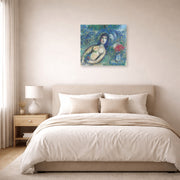 Unframed poster print of Marc Chagall's Nu Incline displayed on a wall in a bedroom