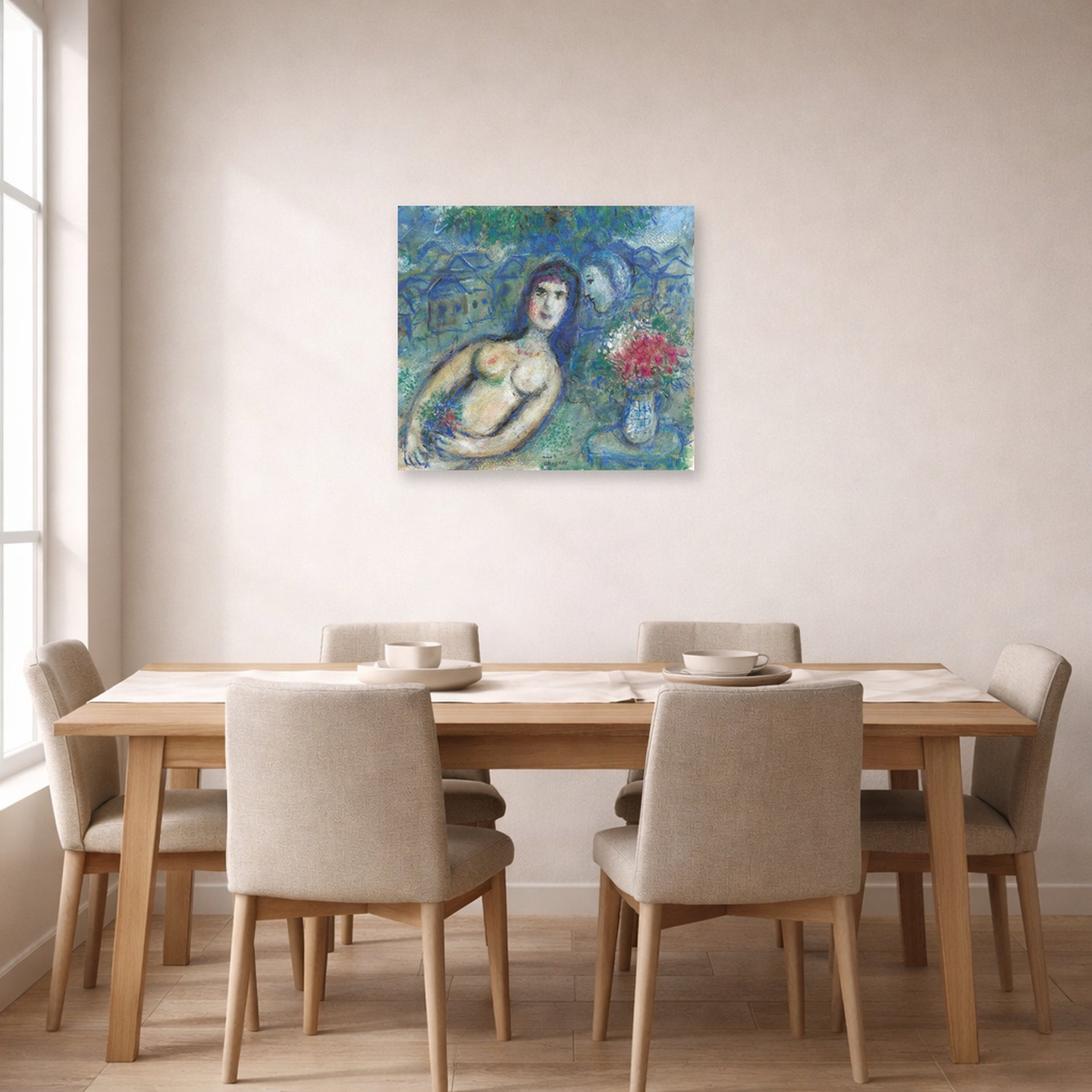 Unframed poster print of Marc Chagall's Nu Incline displayed on a wall in a dining room