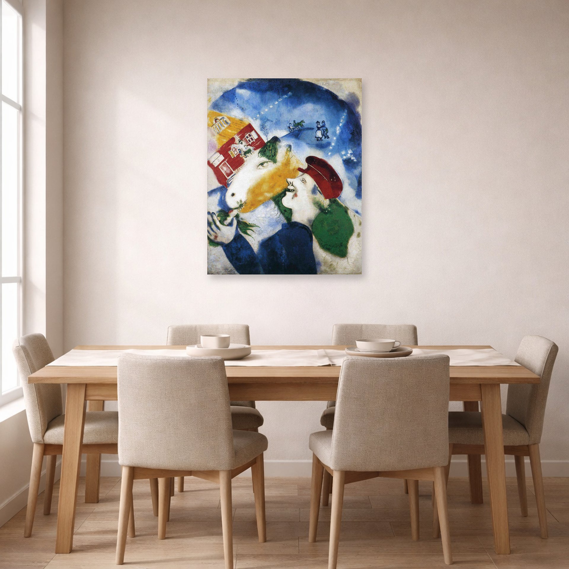 Unframed poster print of Marc Chagall's Peasant Life displayed on a wall in a dining room