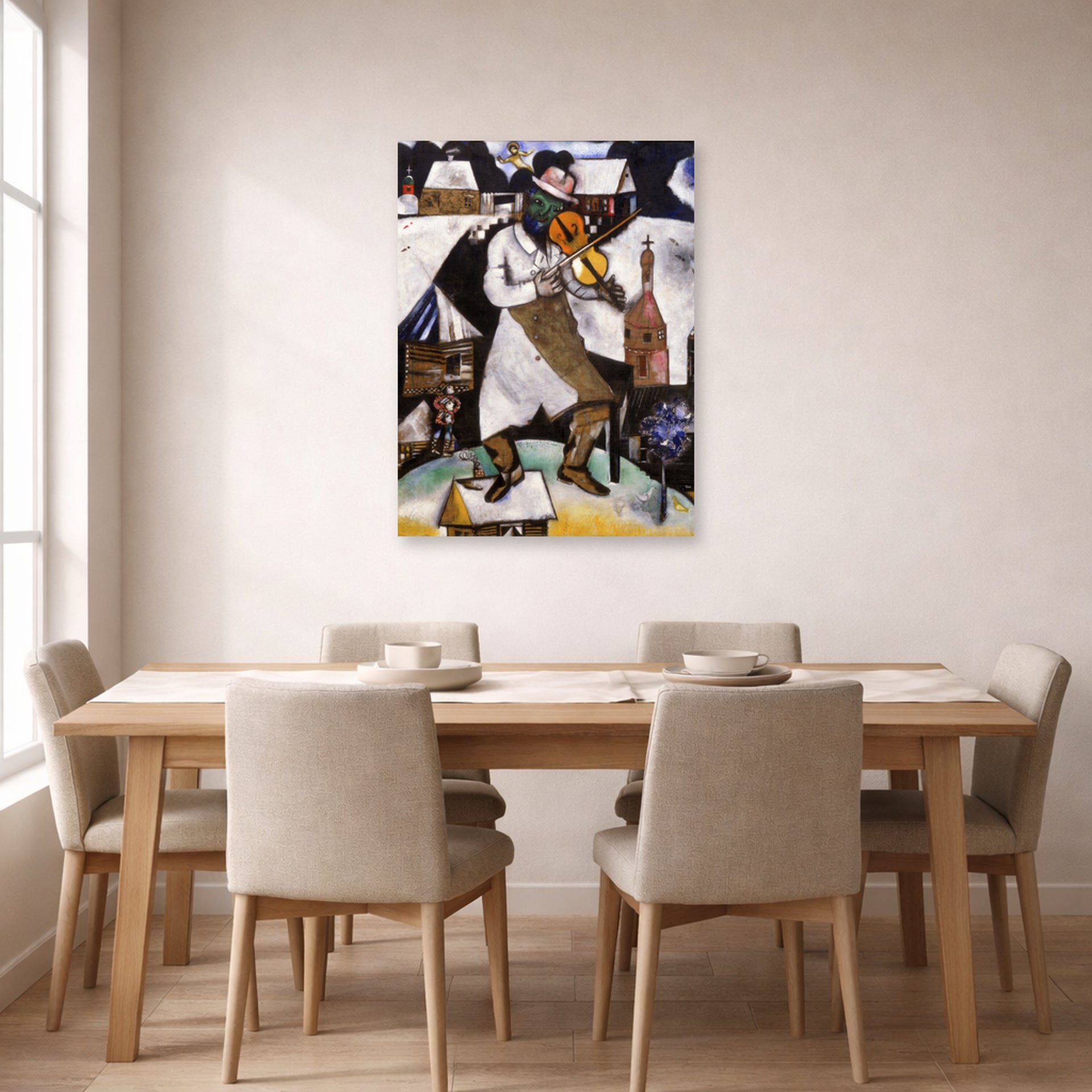 Unframed poster print of Marc Chagall's The Fiddler displayed on a wall in a dining room