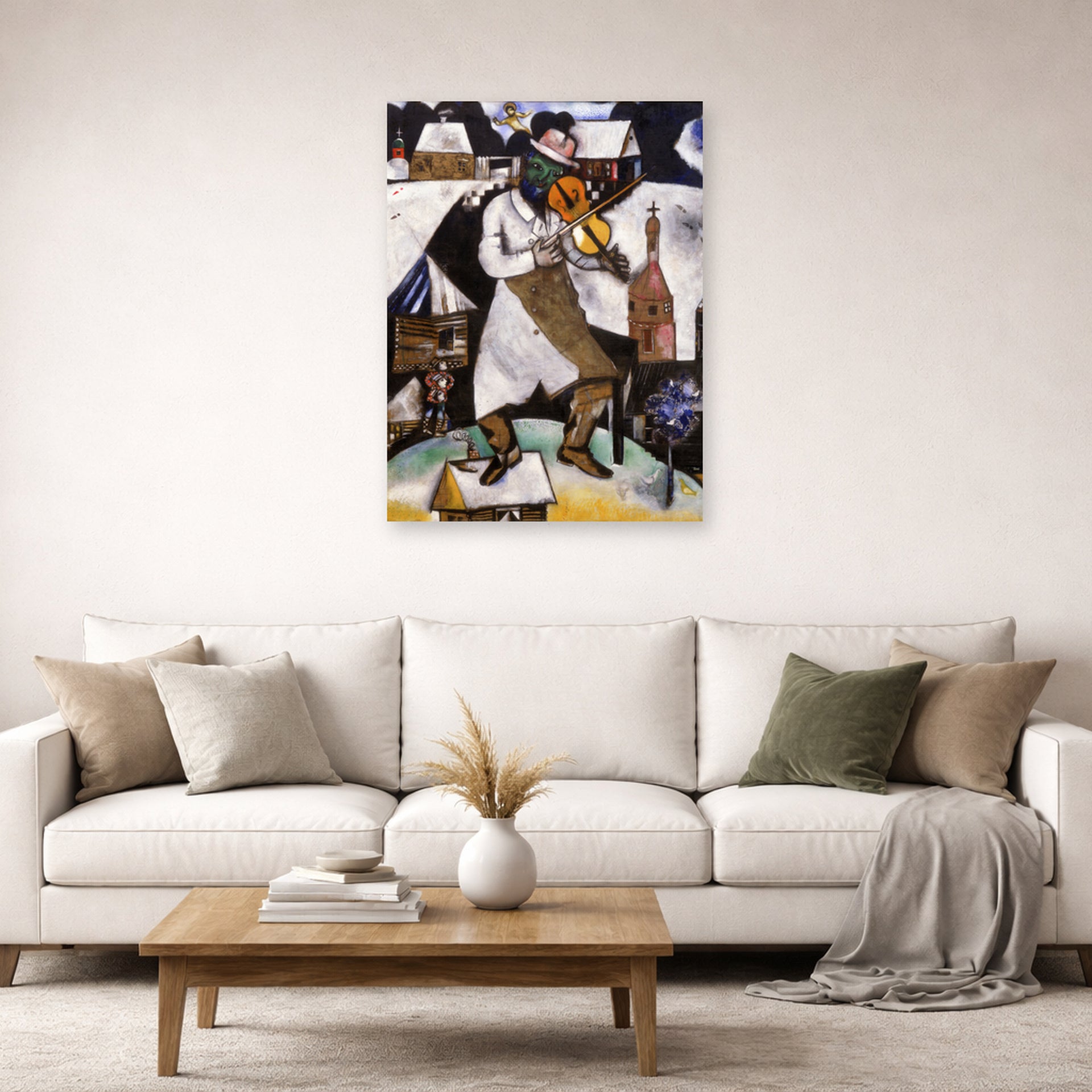 Unframed poster print of Marc Chagall's The Fiddler displayed on a wall in a living room