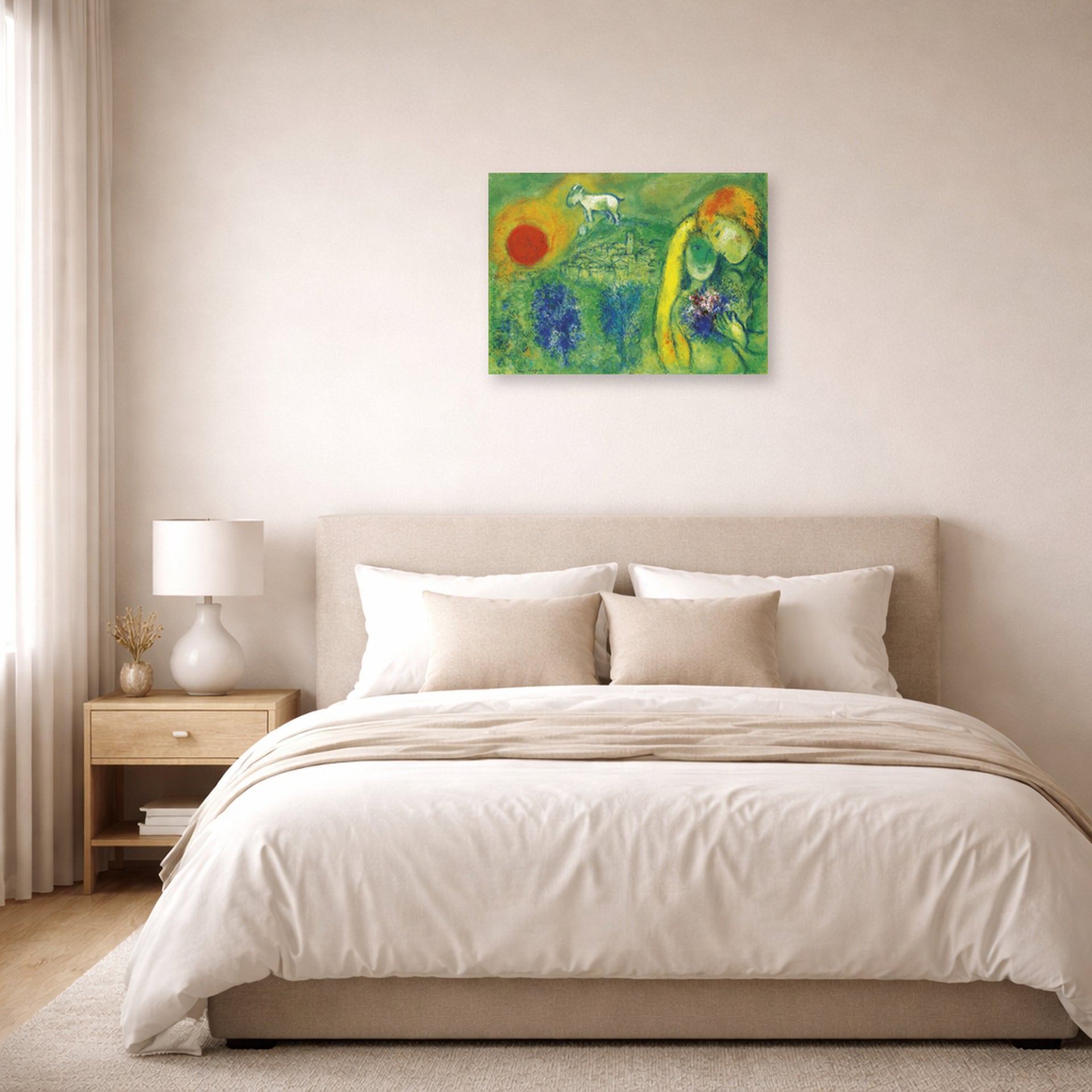 Unframed poster print of Marc Chagall's The Lovers of Vence displayed on a wall in a bedroom