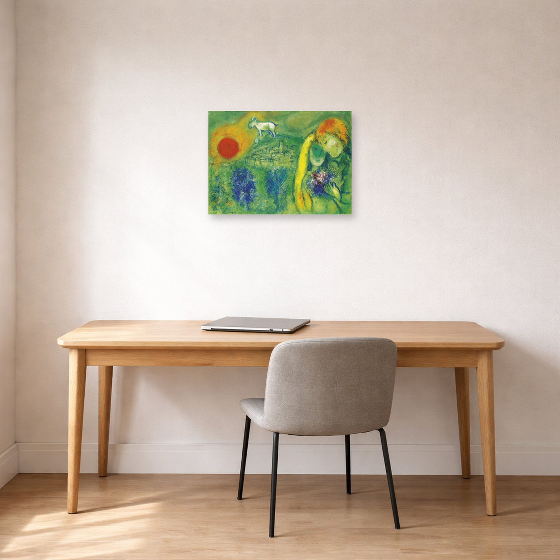 Unframed poster print of Marc Chagall's The Lovers of Vence displayed on a wall in an office