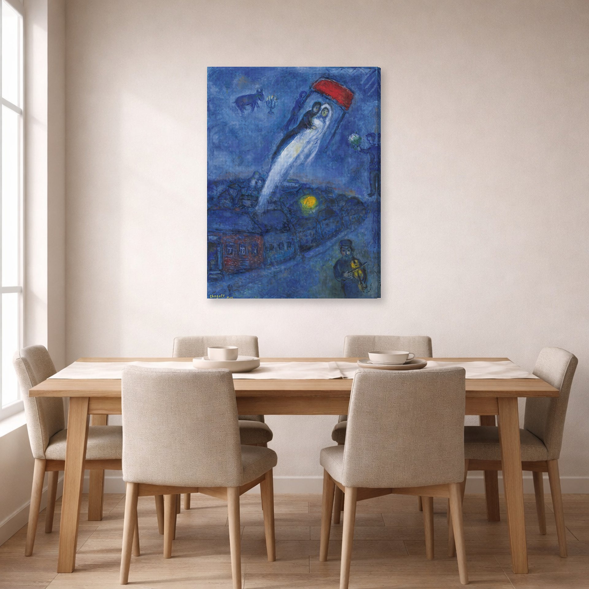Gallery-wrapped canvas print of Marc Chagall's Vision Des Mariés displayed on a wall in a dining room