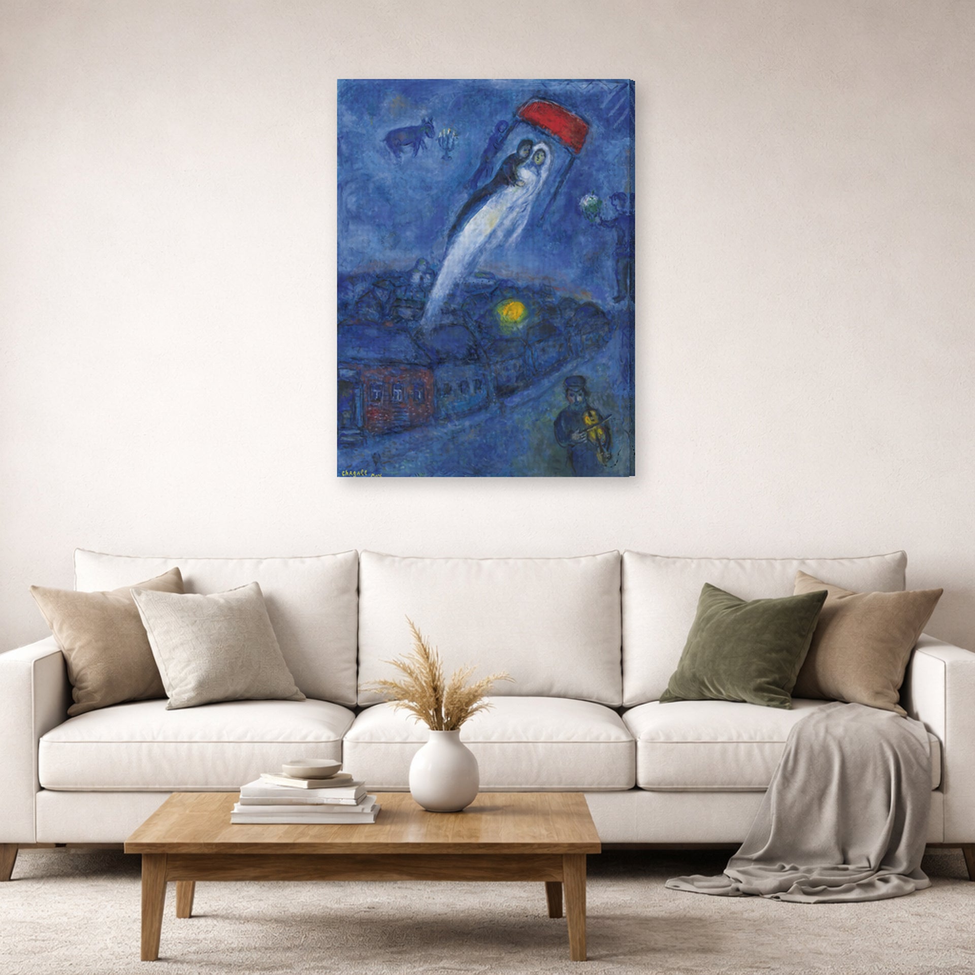 Gallery-wrapped canvas print of Marc Chagall's Vision Des Mariés displayed on a wall in a living room
