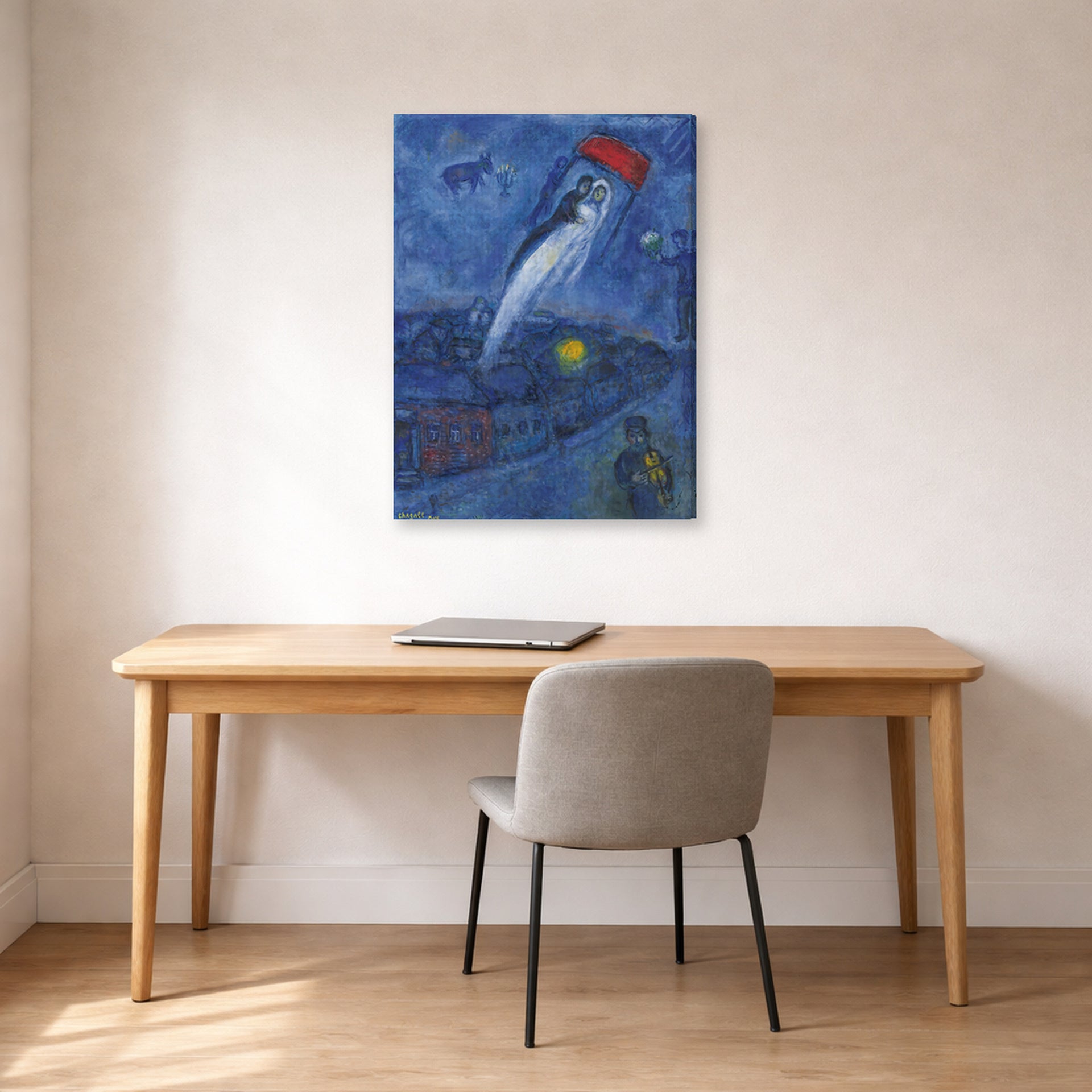 Gallery-wrapped canvas print of Marc Chagall's Vision Des Mariés displayed on a wall in an office