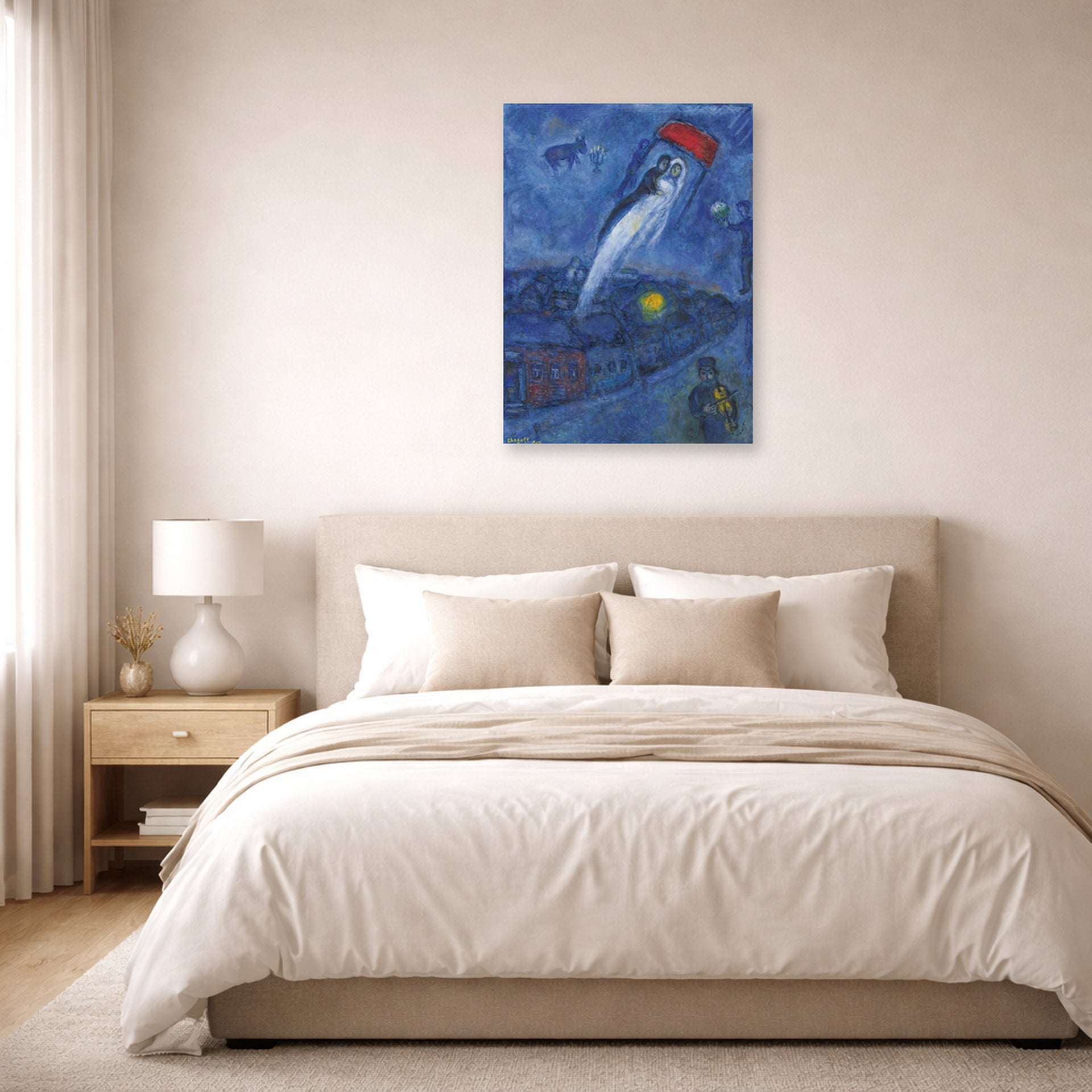 Unframed poster print of Marc Chagall's Vision Des Mariés displayed on a wall in a bedroom