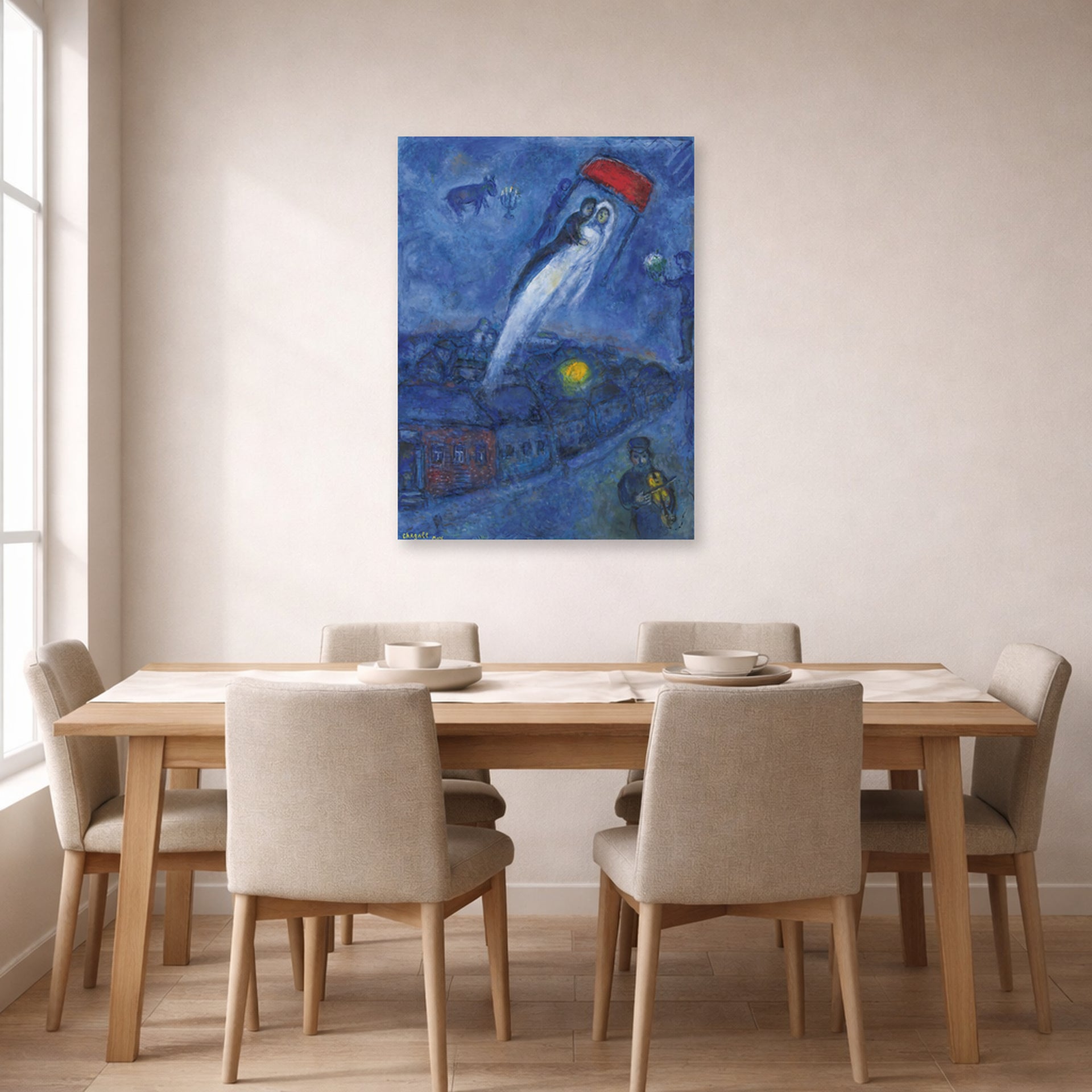 Unframed poster print of Marc Chagall's Vision Des Mariés displayed on a wall in a dining room