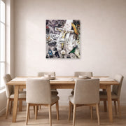Unframed poster print of Marc Chagall's White Crucifixion displayed on a wall in a dining room