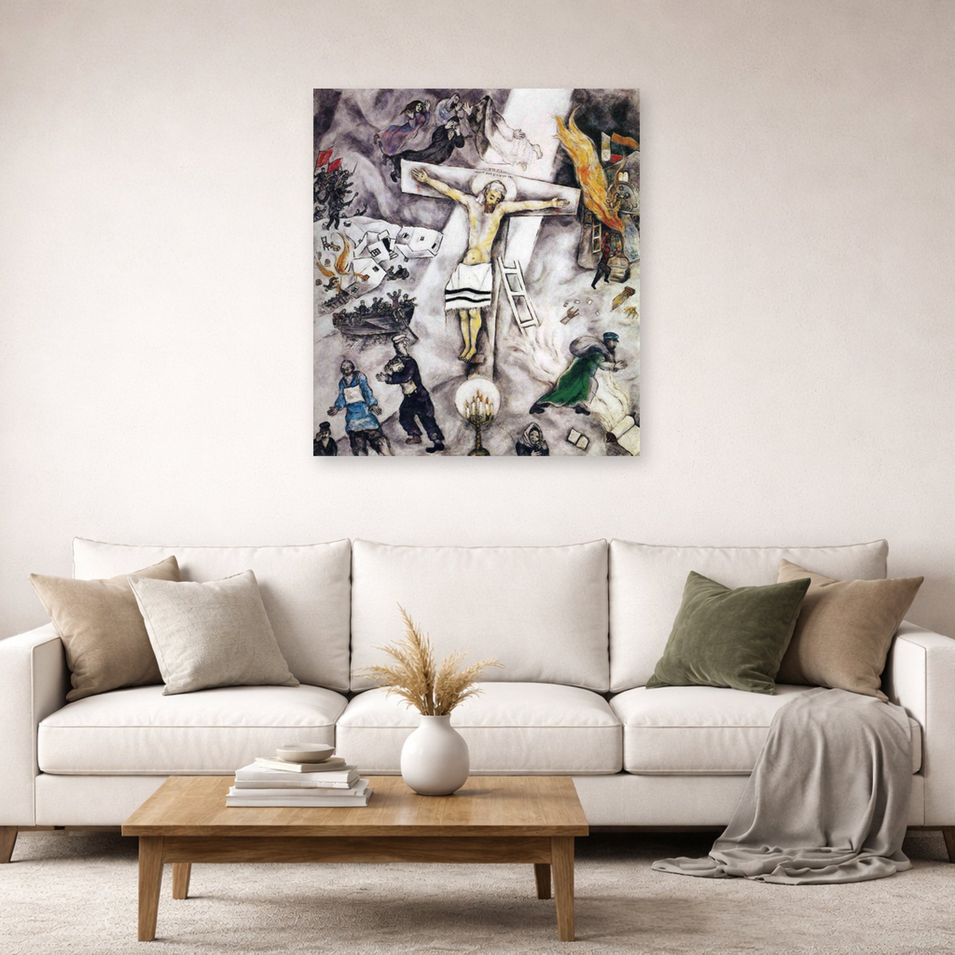 Unframed poster print of Marc Chagall's White Crucifixion displayed on a wall in a living room