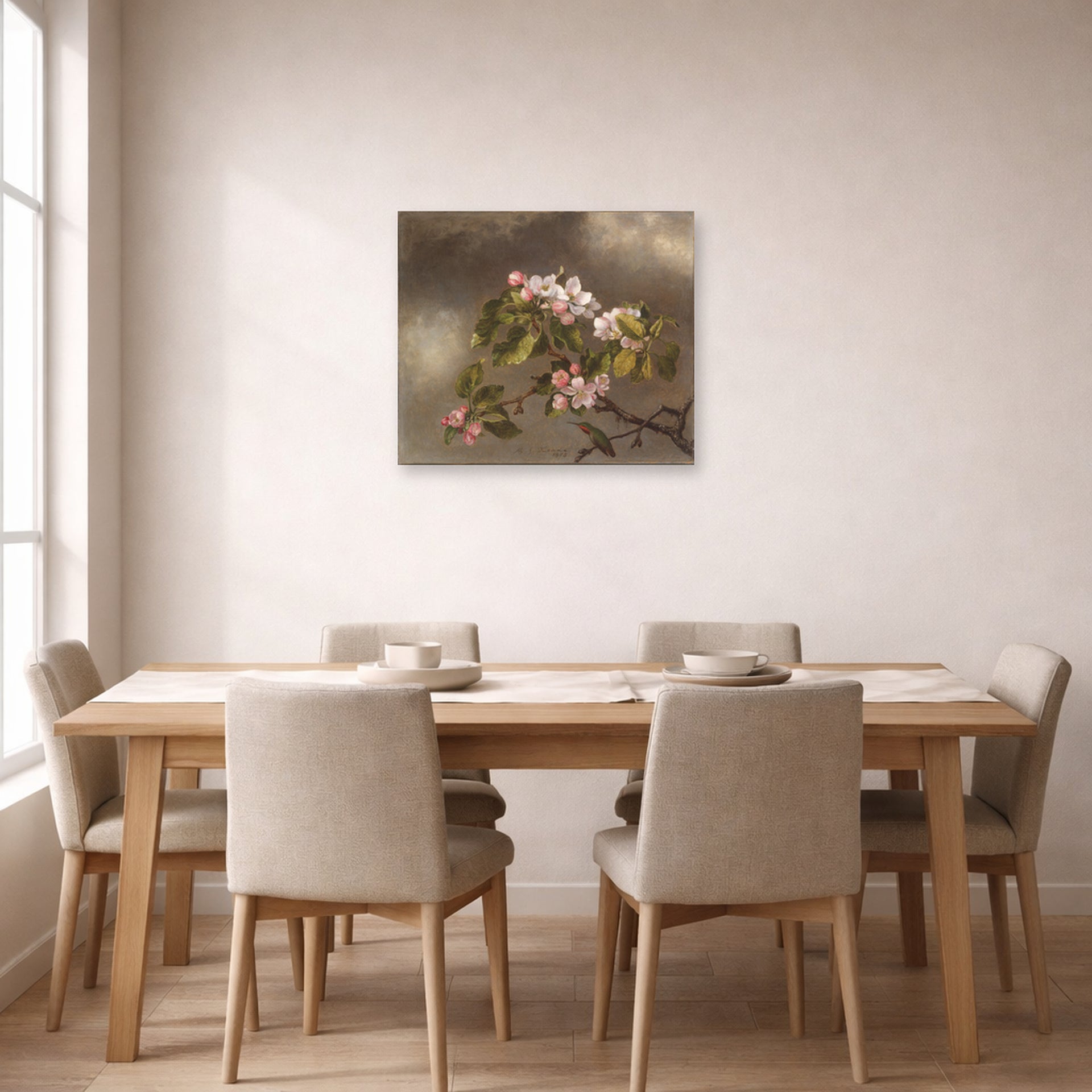 Unframed poster print of Martin Johnson Heade's 'Hummingbird and Apple Blossoms' displayed on a wall in a dining room