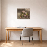 Unframed poster print of Martin Johnson Heade's 'Hummingbird and Apple Blossoms' displayed on a wall in a office