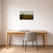 Unframed poster print of Martin Johnson Heade's 'Rocks in New England' displayed on a wall in a office