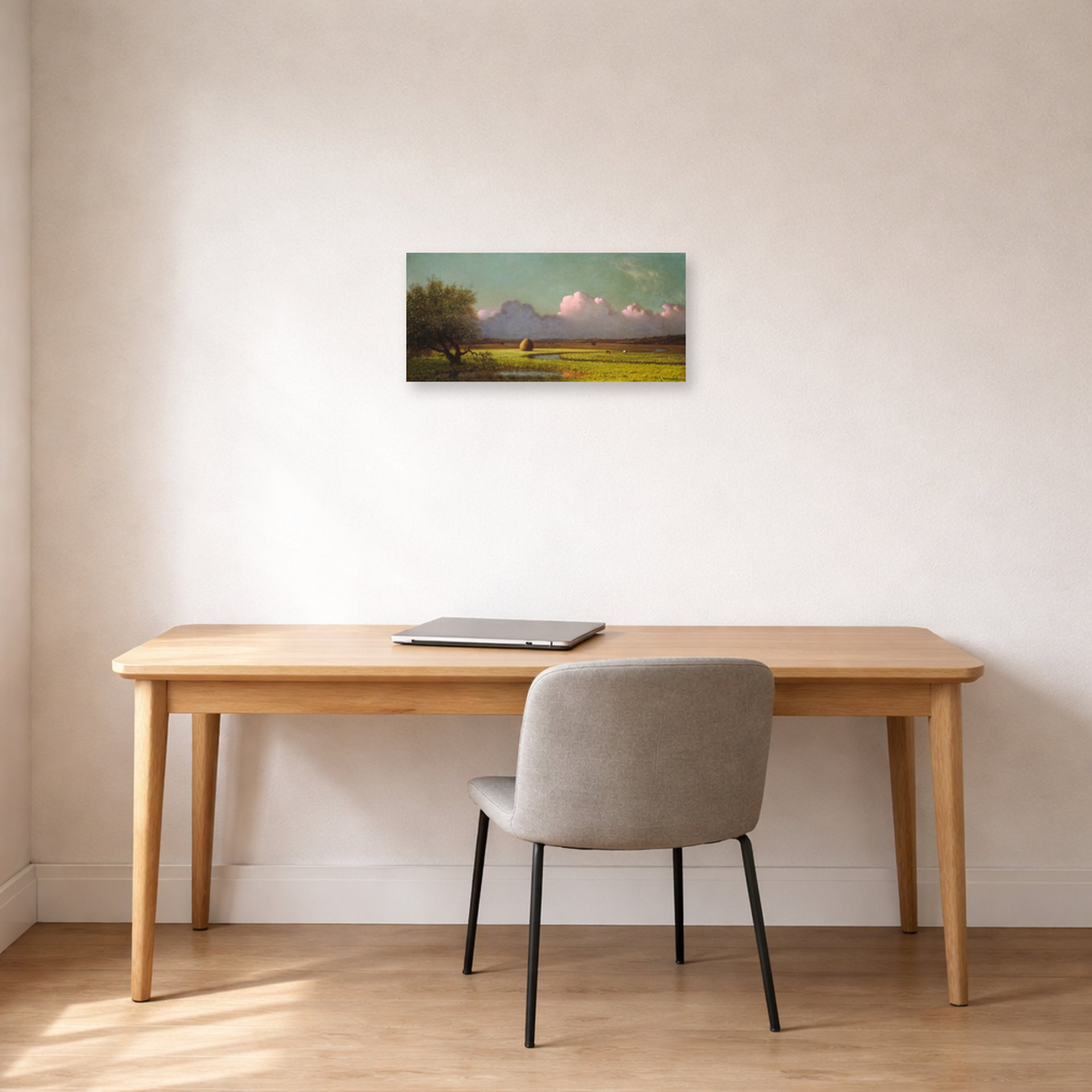 Unframed poster print of Martin Johnson Heade's 'Sunlight and Shadow The Newbury Marshes' displayed on a wall in a office