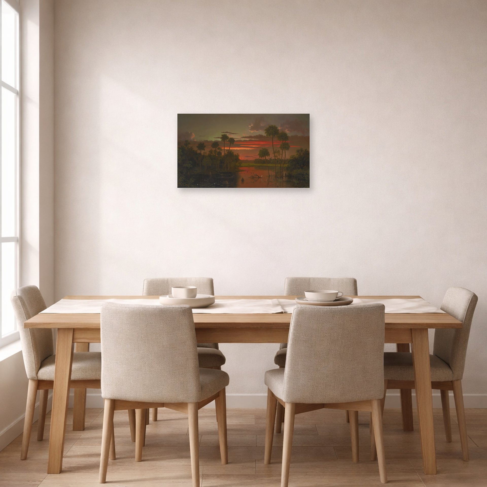 Unframed poster print of Martin Johnson Heade's 'The Great Florida Sunset' displayed on a wall in a dining room