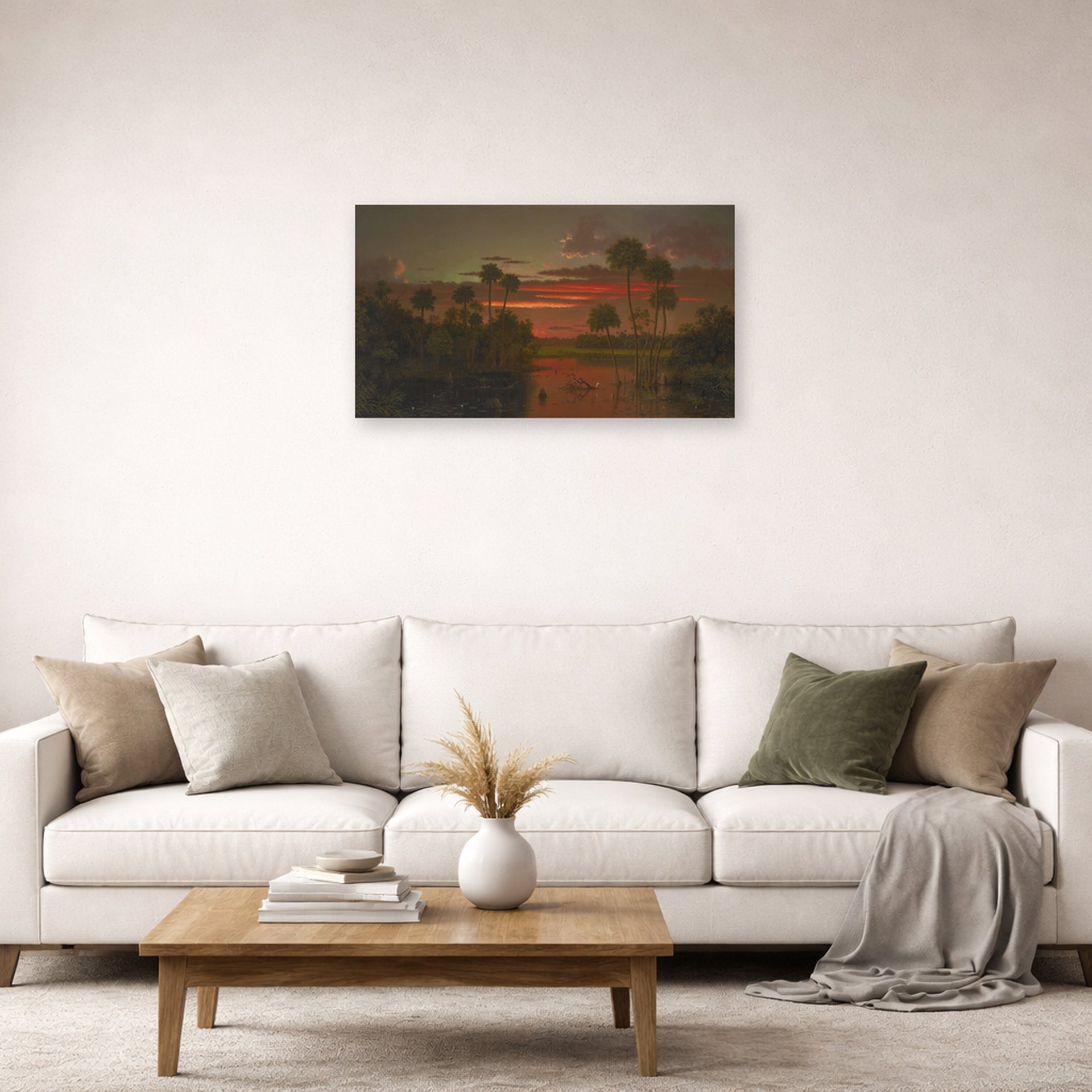 Unframed poster print of Martin Johnson Heade's 'The Great Florida Sunset' displayed on a wall in a living room
