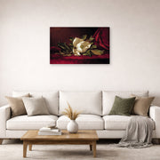 Gallery-wrapped canvas print of Martin Johnson Heade's 'The Magnolia Blossom' displayed on a wall in a living room