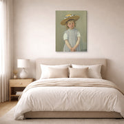 Gallery-wrapped canvas print of Mary Cassatt's Child in a Straw Hat displayed on a wall in a bedroom