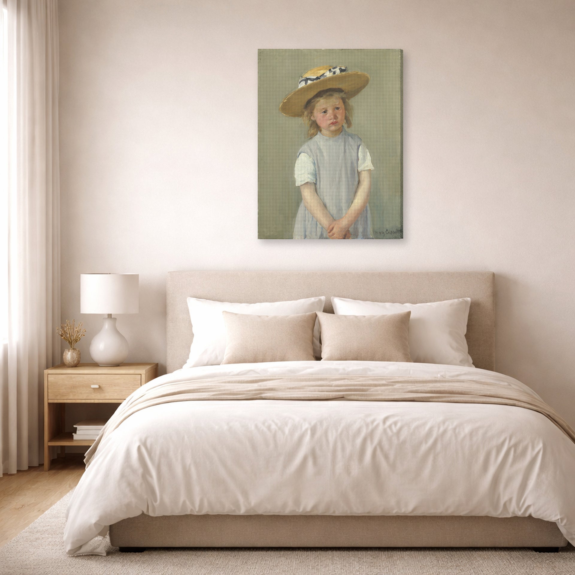 Gallery-wrapped canvas print of Mary Cassatt's Child in a Straw Hat displayed on a wall in a bedroom