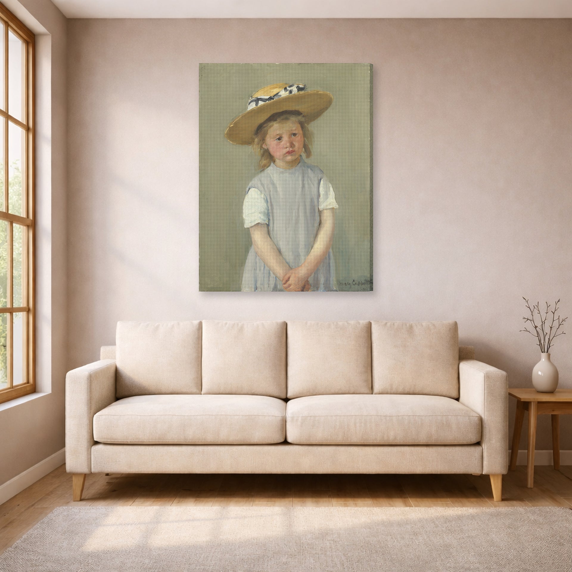 Gallery-wrapped canvas print of Mary Cassatt's Child in a Straw Hat displayed on a wall in a living room