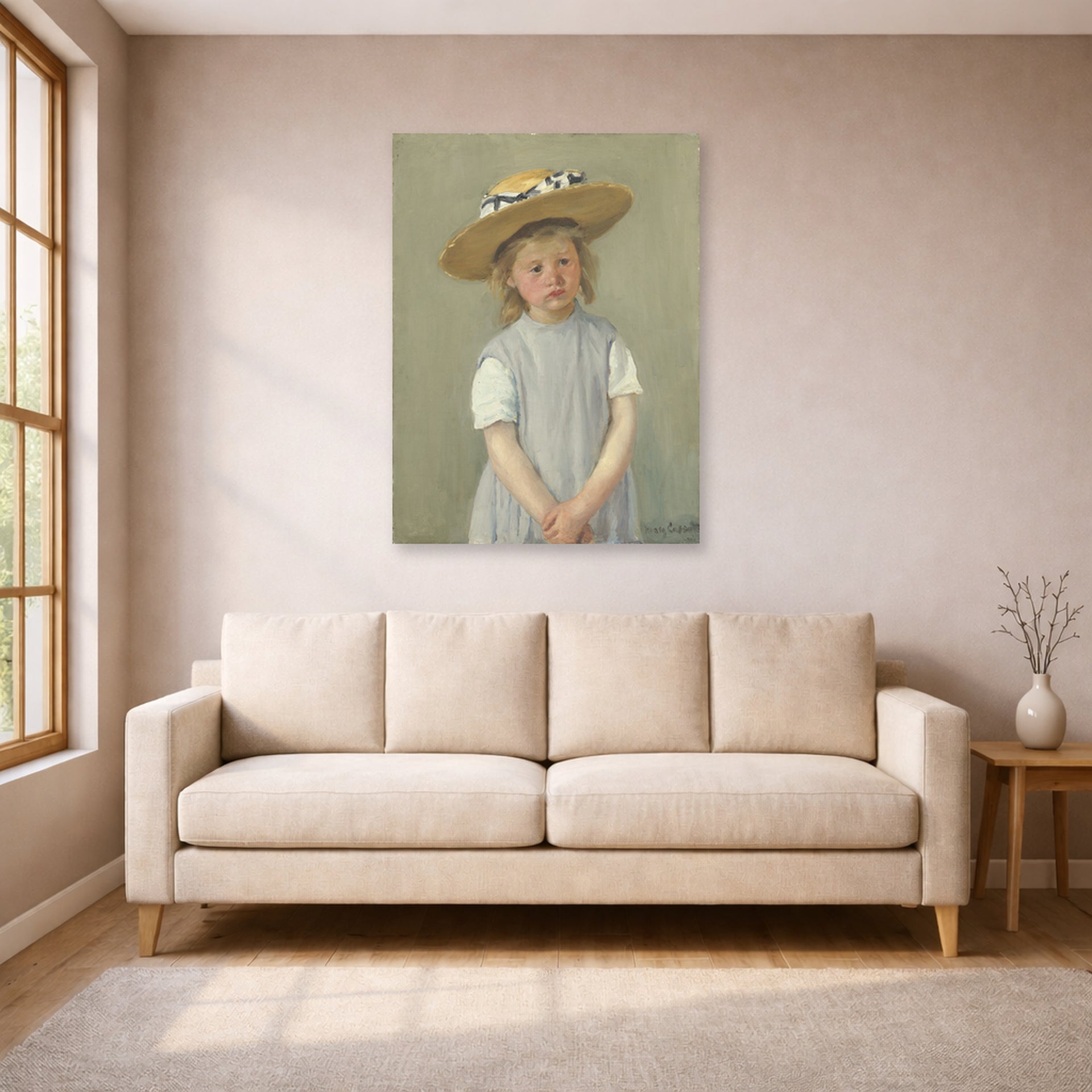 Unframed poster print of Mary Cassatt's Child in a Straw Hat displayed on a wall in a living room