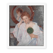 Mary Cassatt's 'Denise at Her Dressing Table' painting reproduced as a rolled canvas print
