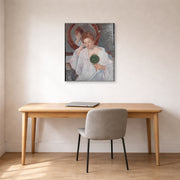 Gallery-wrapped canvas print of Mary Cassatt's Denise at Her Dressing Table displayed on a wall in a office