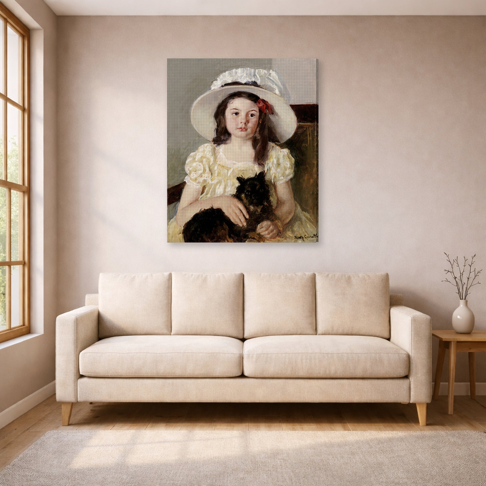 Gallery-wrapped canvas print of Mary Cassatt's Francoise Holding a Little Black Dog displayed on a wall in a living room