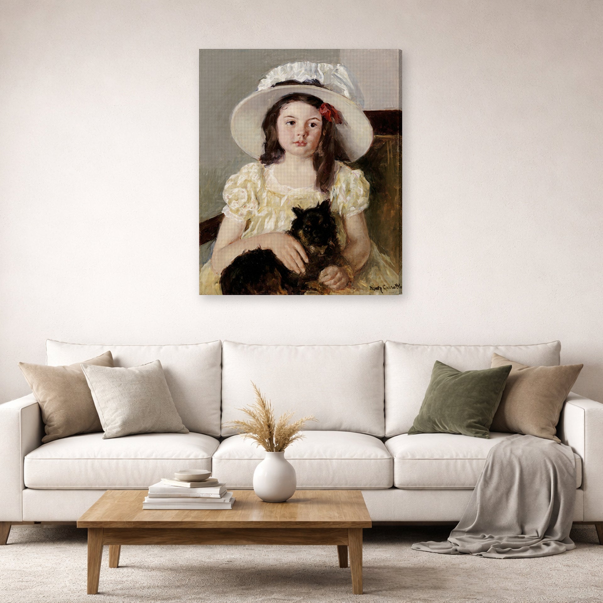 Gallery-wrapped canvas print of Mary Cassatt's Francoise Holding a Little Black Dog displayed on a wall in a living room