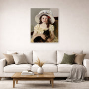 Unframed poster print of Mary Cassatt's Francoise Holding a Little Black Dog displayed on a wall in a living room