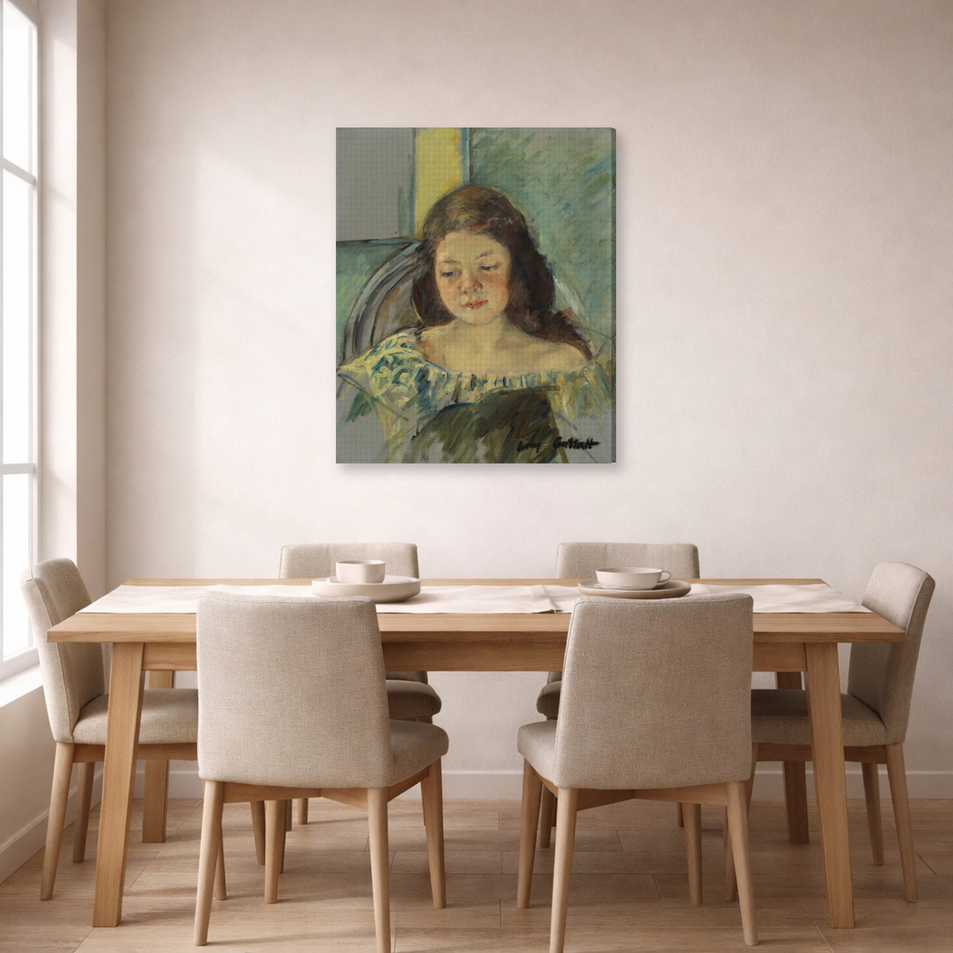 Gallery-wrapped canvas print of Mary Cassatt's Françoise in a Round Backed Chair Reading displayed on a wall in a dining room