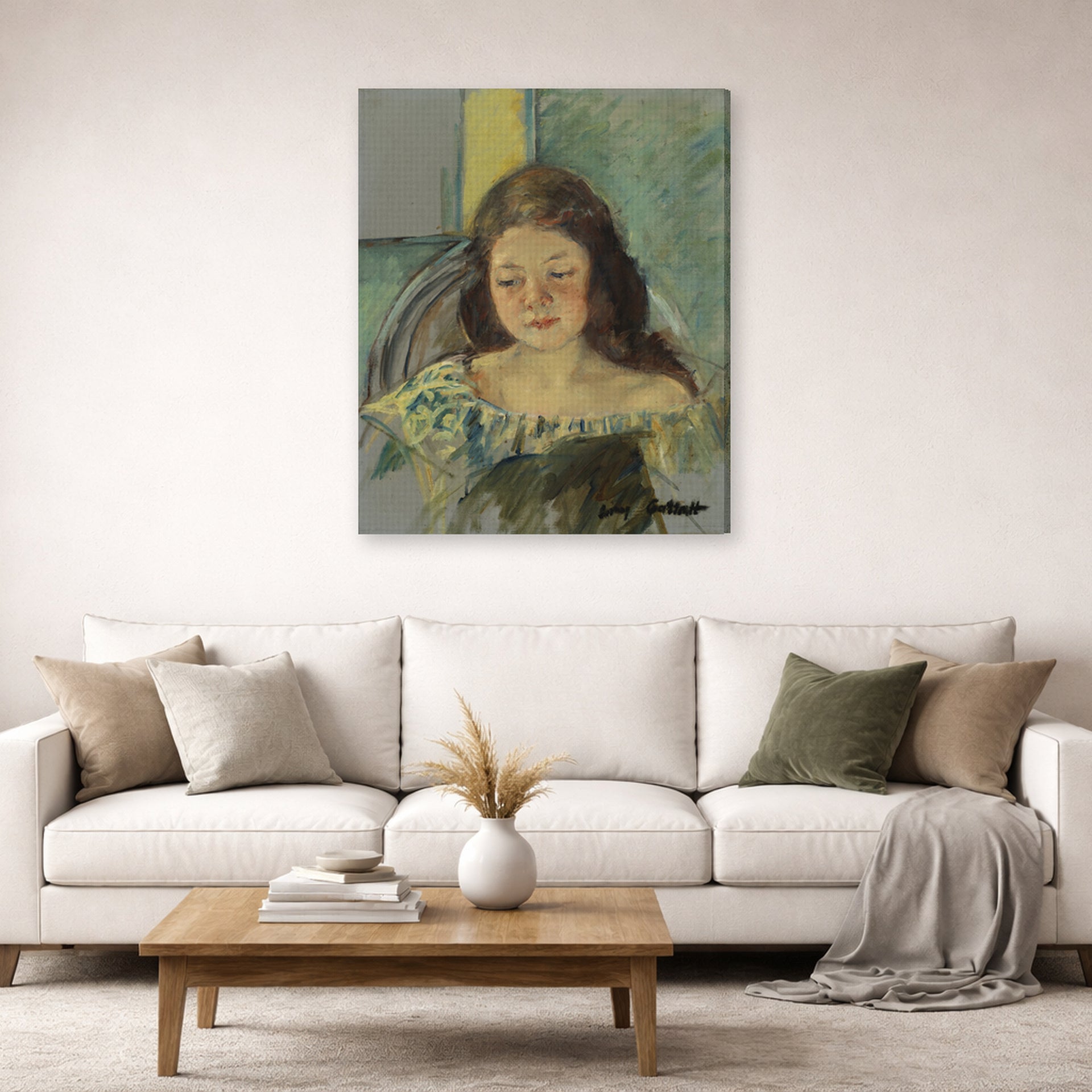 Gallery-wrapped canvas print of Mary Cassatt's Françoise in a Round Backed Chair Reading displayed on a wall in a living room