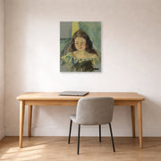 Unframed poster print of Mary Cassatt's Françoise in a Round Backed Chair Reading displayed on a wall in a office