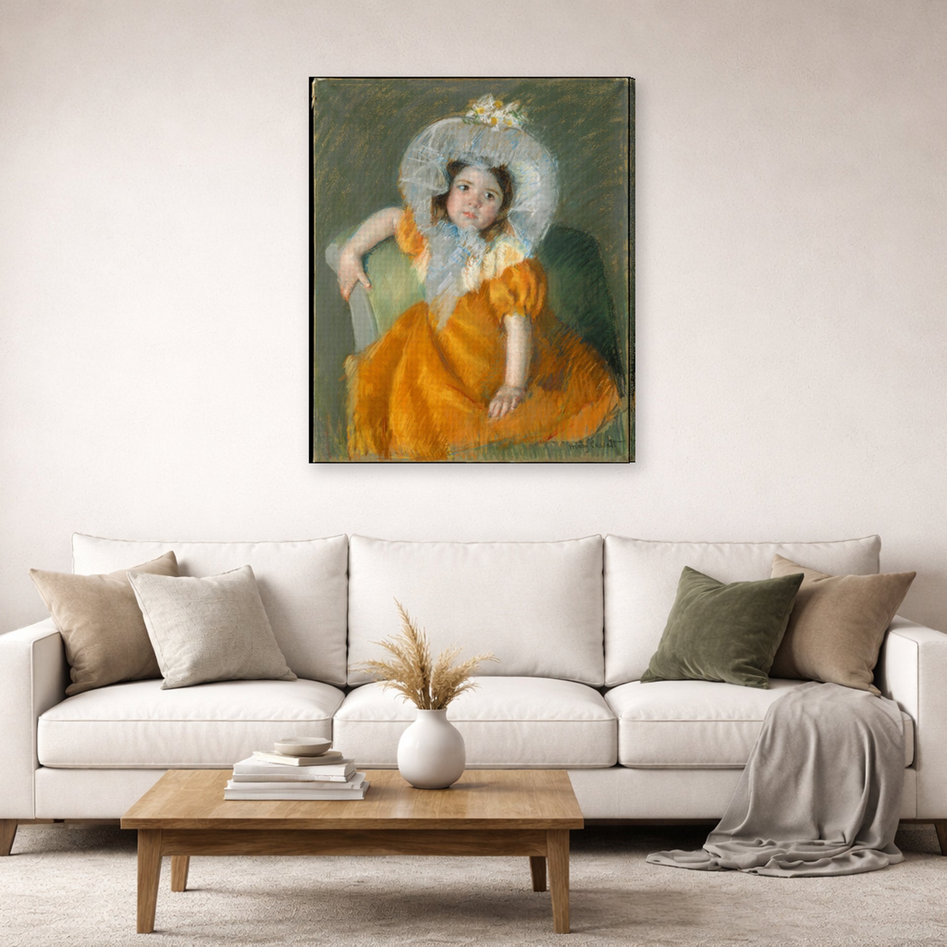 Gallery-wrapped canvas print of Mary Cassatt's Margot in Orange Dress displayed on a wall in a living room