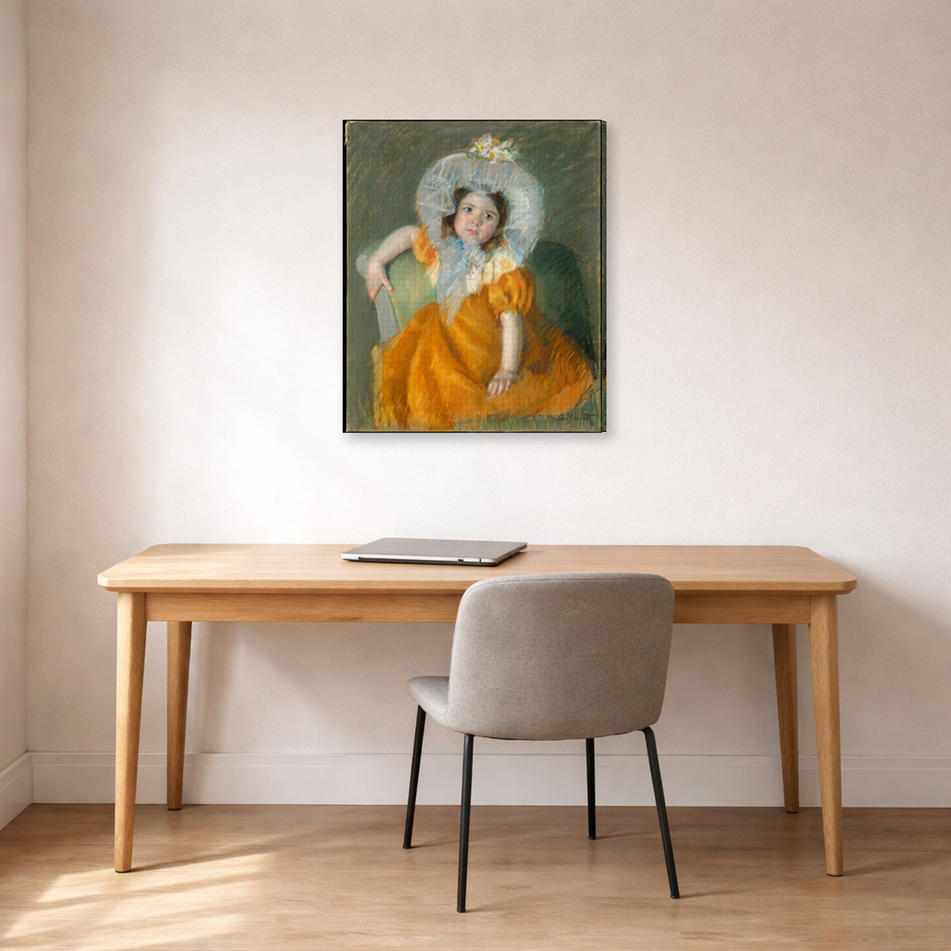 Gallery-wrapped canvas print of Mary Cassatt's Margot in Orange Dress displayed on a wall in a office