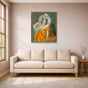 Unframed poster print of Mary Cassatt's Margot in Orange Dress displayed on a wall in a living room
