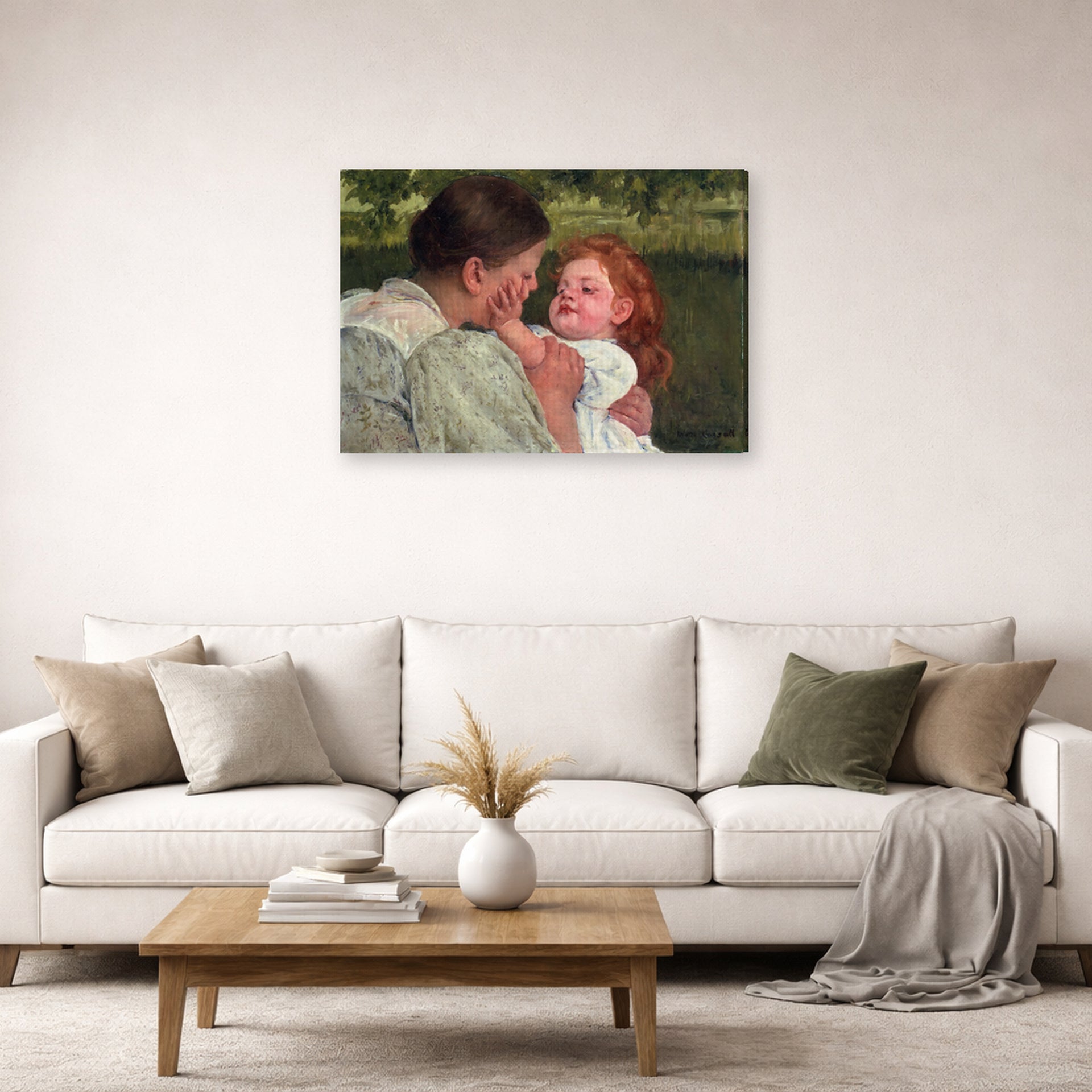 Gallery-wrapped canvas print of Mary Cassatt's Maternal Caress displayed on a wall in a living room
