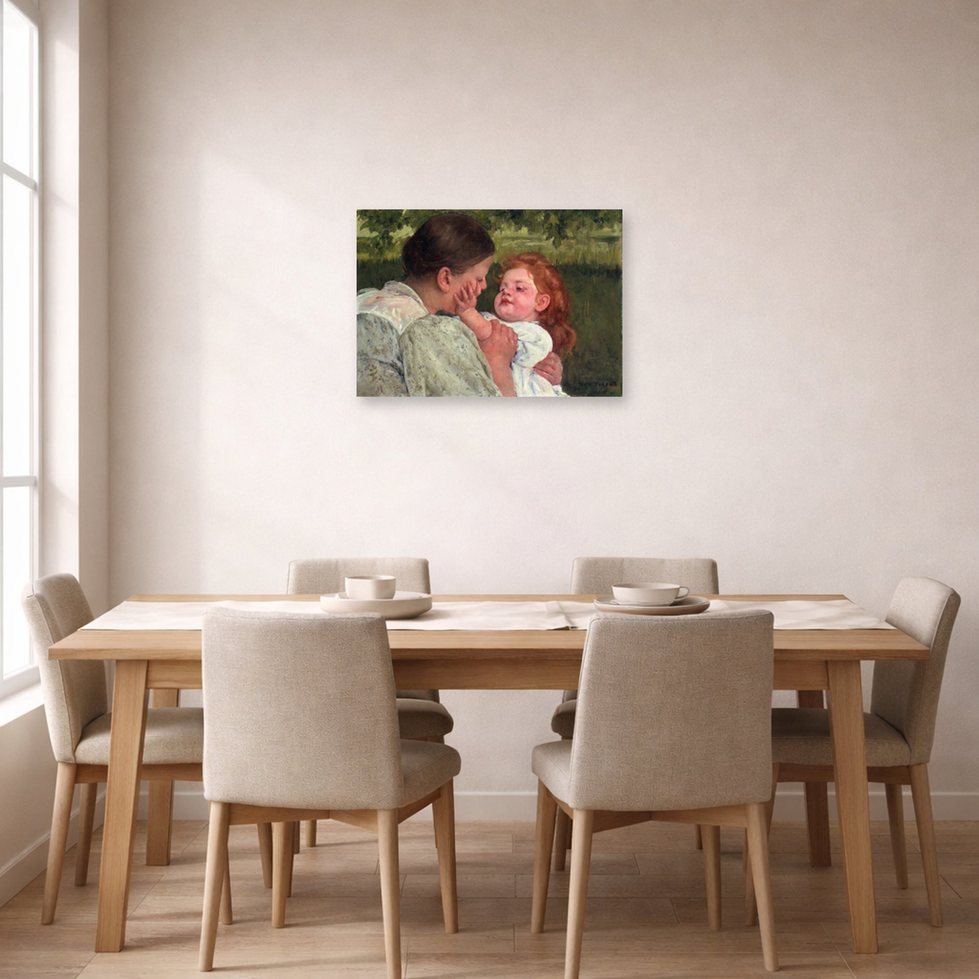 Unframed poster print of Mary Cassatt's Maternal Caress displayed on a wall in a dining room