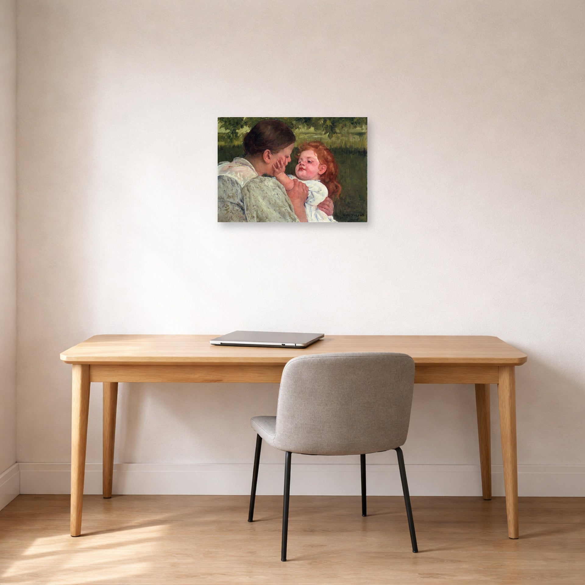 Unframed poster print of Mary Cassatt's Maternal Caress displayed on a wall in a office