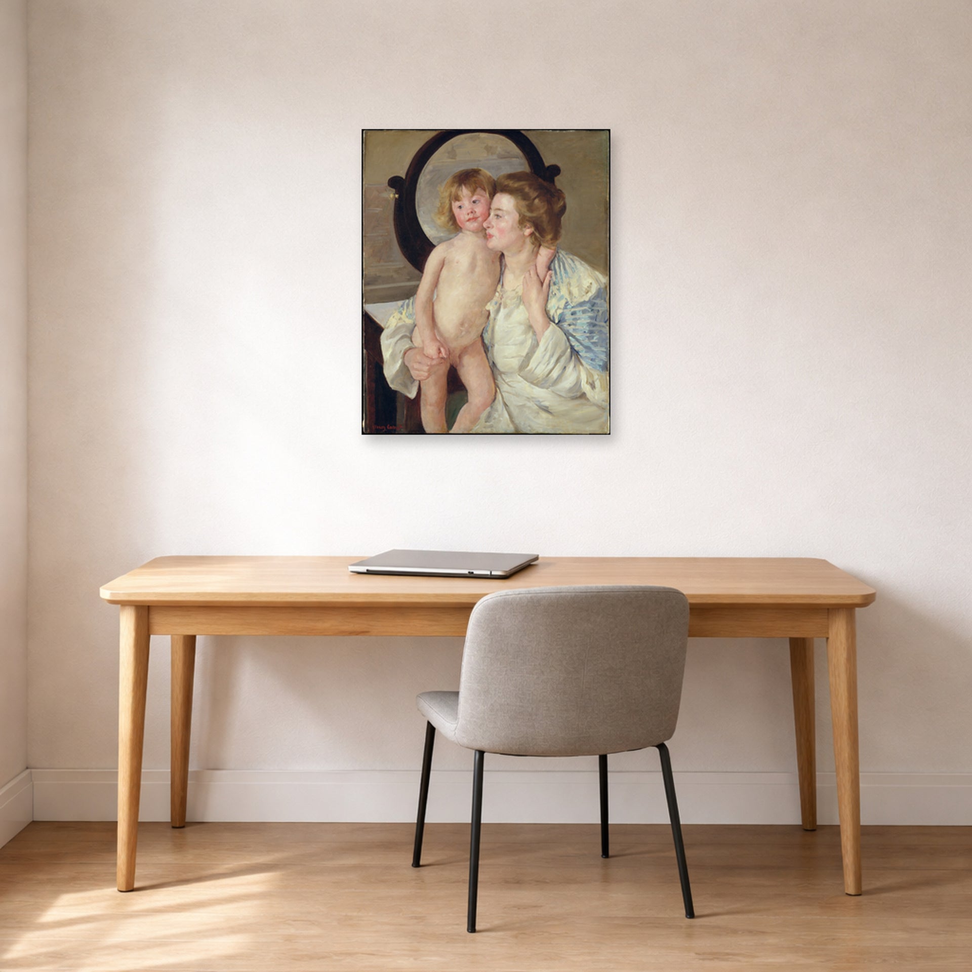 Unframed poster print of Mary Cassatt's Mother and Child (The Oval Mirror) displayed on a wall in a office